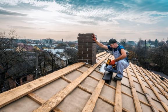 Pose de conduit de cheminée